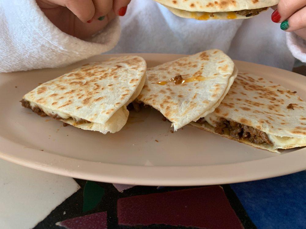 Quesadilla · Flour tortilla lightly grilled and filled with jack cheese.
