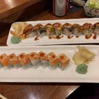 Dragon Roll · Tempura shrimp, crabmeat & cucumber topped with unagi, avocado.