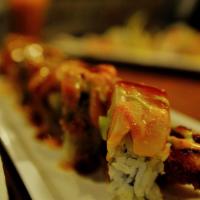 Kabuki Roll · Spicy crunch roll topped with tuna, salmon, yellowtail, spicy albacore, spicy tuna, smelt eg...
