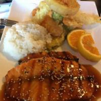 Salmon Teriyaki · Charbroiled choice-cut salmon and teriyaki sauce. Served with soup, salad and rice.