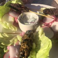 Lamb Kebab Lettuce Wraps · Fresh lamb, Romaine lettuce, pickled onions, cucumbers, radish, coconut tzatziki. Dairy free...