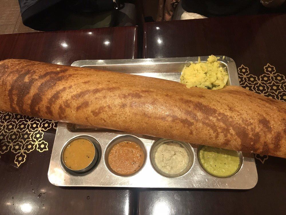 Masala Dosa · Thin rice and lentil crepe filled with spiced mashed potatoes and onions.