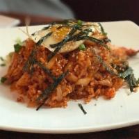 Kimchi Fried Rice · Korean fried rice and chopped kimchi with pork. Spicy.