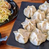 Buuz · Mongolian steamed dumpling. 10 pieces.