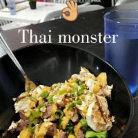Thai Monster Bowl · Grilled hormone-free, cage-free chicken, certified angus beef steak, broccoli, asparagus, gr...