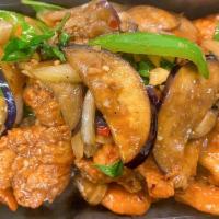 Crispy Chicken Madness · Stir-fried crispy chicken with eggplant, onion, bell pepper, basil leave, garlic, and Thai c...