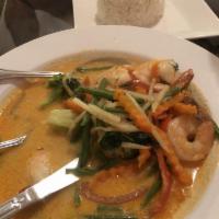 Red Curry · Blended of dry roasted Thai chilies, herbs, bamboo shoots, carrots, green beans, sweet basil...