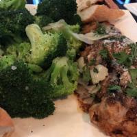 Chicken Marsala · Pan fried chicken breast, mushroom, Marsala sauce, capellini pasta and steamed broccoli. Ser...