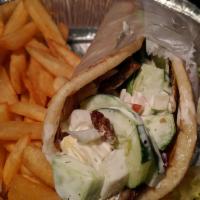 Lamb Gyro Platter · Served with rice salad and pita bread.
