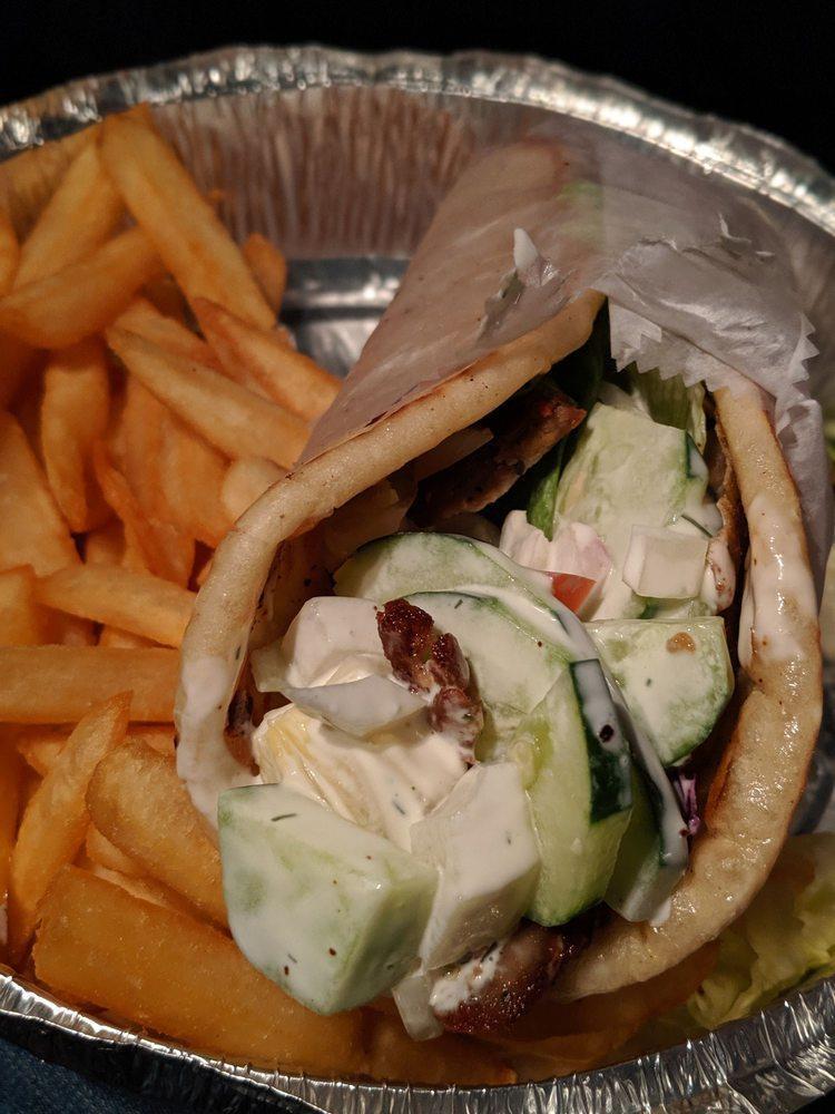Lamb Gyro Platter · Served with rice salad and pita bread.