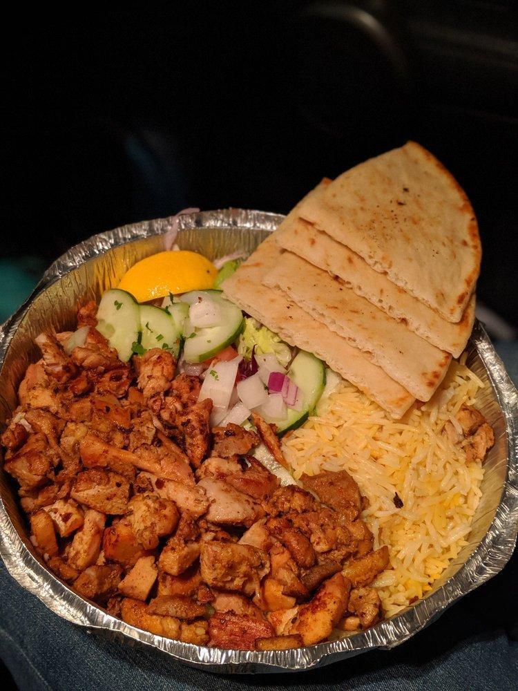 Chicken Gyro Platter · Served with rice salad and pita bread.