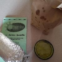 Tofu Burrito · Marinated and blackened. A vegetarian favorite. A huge stuffed and rolled burrito with choic...