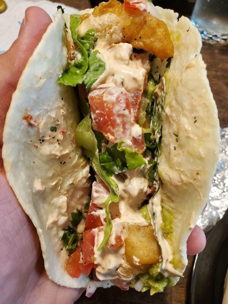 Surf Tacos · Soft shell, breaded shrimp with chipotle lime sour cream, guacamole, avocado, salsa fresca, lettuce.