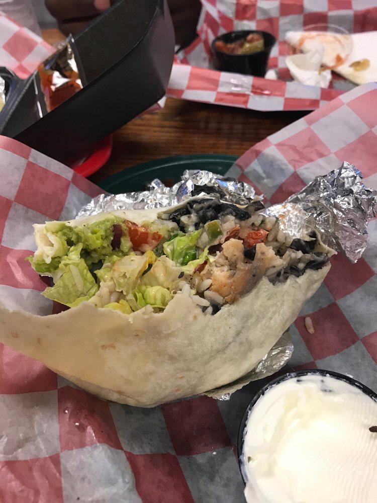 Surf Burrito · Breaded shrimp with guacamole and salsa fresca. A huge stuffed and rolled burrito with choice of beans, lime pepper rice, cheddar jack cheese, salsa, sour cream, chipotle sauce and crisp lettuce.