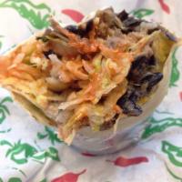 Carnitas Burritos · Slow roasted pulled pork. A huge stuffed and rolled burrito with choice of beans, lime peppe...