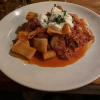 La Nonna · Tomato sauce simmered with pork, meatballs, and sausage tossed with rigatoni and parmesan ch...