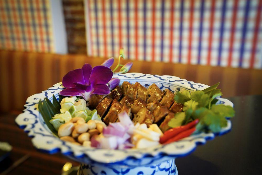Lao Sausage · Laotian style pork sausage served with fresh ginger and toasted peanut.
