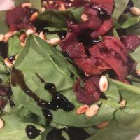 Spinach Salad · Gluten free. Fresh baby spinach, dried cranberries, goat cheese and pine nuts. Served with b...