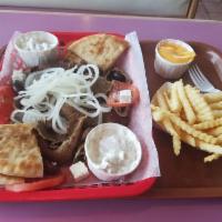 Gyros Plate Combo · Small Greek salad and fries.