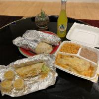 Veggie Burrito · Whole Beans, rice, fresh salsa, cheese, guacamole, sour cream, and lettuce.
