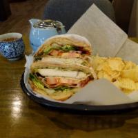 Chicken Avocado Croissant · Freshly made chicken croissant sandwich. Comes with a side of chips or fresh fruits (pineapp...