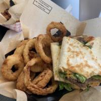 Bacon Ranch Burger Wrap · Toasted flour tortilla filled with beef patty, bacon, jack cheese, ranch and lettuce. Served...