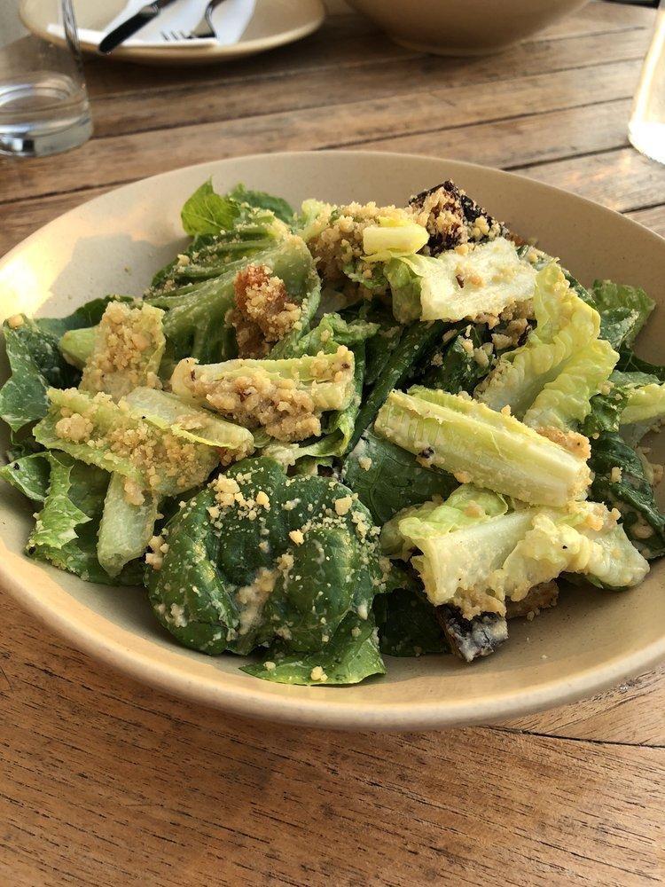 Sunflower Caesar Salad · Romaine, wood-fried croutons, almond parmesan. Dressing contains soy. Can be made GF and NF with the removal of croutons and or almond parmesan. 