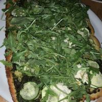 Pesto Pizza · Almond ricotta, zucchini arugula, almond parmesan.