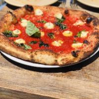 Margherita Pizza · Tomato, basil, cashew mozzarella.