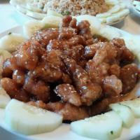 Sesame Chicken · Crispy chicken sauteed in a special brown sauce and served with sesame seeds on top.