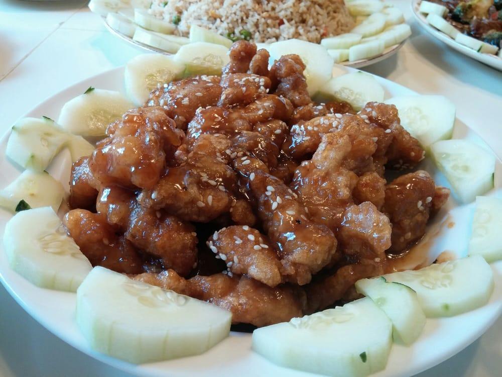 Sesame Chicken · Crispy chicken sauteed in a special brown sauce and served with sesame seeds on top.