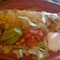 Expresso Burrito · Flour tortilla filled with beef or chicken, rice and beans. Topped with cheese, lettuce, sou...