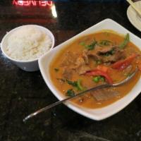 Panang Curry · Panang curry paste with meat, carrot, peas and basil leaves. Spicy.