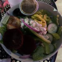 Greek Salad · Lettuce, tomatoes, red onions, cucumbers, olives, beets pepperoncini, green pepper, feta che...