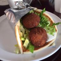 Falafel Pita · Grounded chickpeas mixed with vegetables and spices deep fried, lettuce, tomatoes, onions, t...