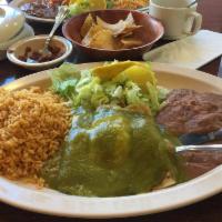 Enchiladas · Red mild or green spicy salsa comes with rice and beans meat choices of chicken, ground beef...