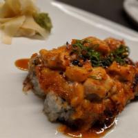 Lava Roll · Crunchy shrimp, cucumber, topped with masago aioli, salmon, baked and topped with scallion, ...