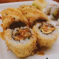 Crunchy Roll · Crunchy shrimp and avocado rolled in crunchies with tsu sauce.