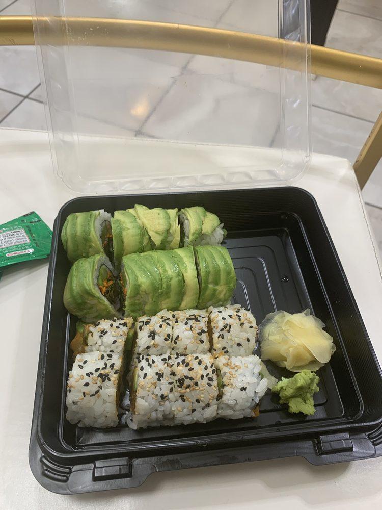 Dynamite Roll · Spicy marinated diced tuna, white fish, salmon, avocado, and sesame seeds. Raw. Sub brown rice for Eat Fit.