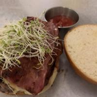 Grass Fed Beef Burger · Swiss cheese, turkey bacon, and alfalfa sprout.