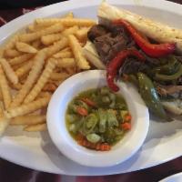 Italian Beef Sandwich · Shredded roast beef marinated in au jus. Served with a side of au jus. Includes choice of ho...
