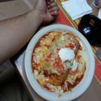 Expresso Burrito · The best of Celia's wrapped up in one giant flour tortilla with rice, beans, cheese, and you...