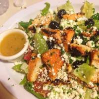Greek Salad · Lettuce, black olives, tomatoes, cucumber and feta cheese tossed with olive oil and lemon ju...