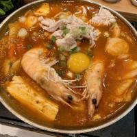 Korean Kimchi Hot Pot · Nappa, sliced pork, firm tofu, kimchi, shrimps, enoki mushrooms, kamaboko, clam, egg, imitat...