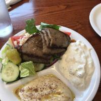 Gyro Platter · Beef and lamb or chicken. Greek salad, cucumber sauce and hummus. Gluten free.