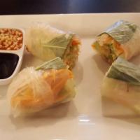 Deep Fried Spring Rolls · 4 pieces of deep-fried vegetables wrapped in crispy egg paper and served with a side of swee...