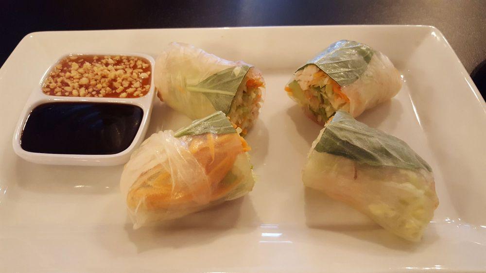 Deep Fried Spring Rolls · 4 pieces of deep-fried vegetables wrapped in crispy egg paper and served with a side of sweet and sour sauce.
