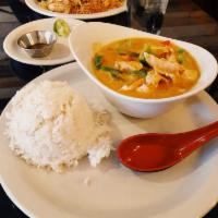 Panang Curry · Gluten-free. Thai creamy Panang curry slow-cooked in coconut milk with green beans and bell ...