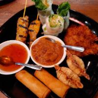 Spring Rolls · Black mushrooms, taro, vegetables and mung bean noodles in spring roll pastry deep-fried wit...