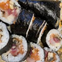 8 Piece Sumo Roll · Tuna, salmon, yellowtail, eel, white fish and eel sauce.